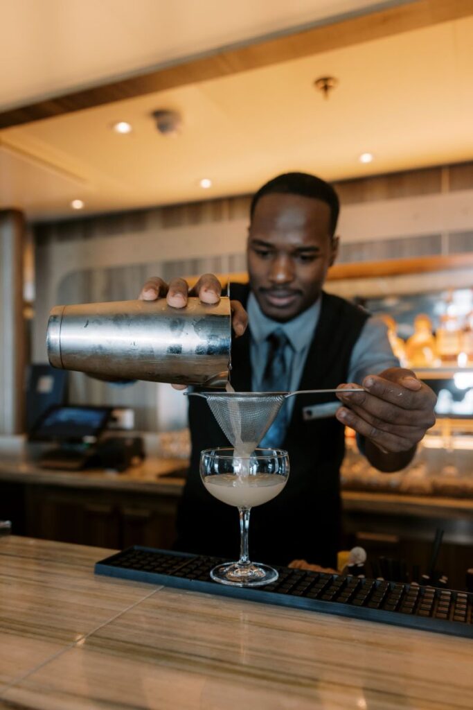 Bartender pouring a non-alcoholic drink