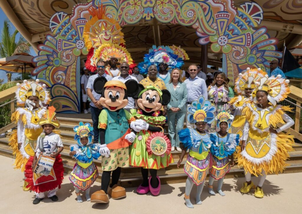 Mickey Mouse and Minnie Mouse in Bahamian outfits on Disney Lookout Cay at Lighthouse Point 